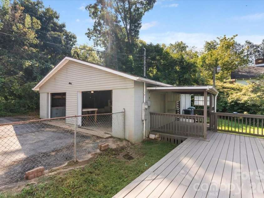 2 Elkmont Place, Asheville, NC 28804.  MLS# CAR4417768, YatesRealty ID 48512. Back deck with part covered area