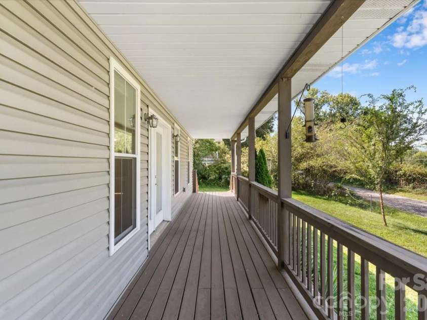 2 Elkmont Place, Asheville, NC 28804.  MLS# CAR4417768, YatesRealty ID 48512. Covered front porch