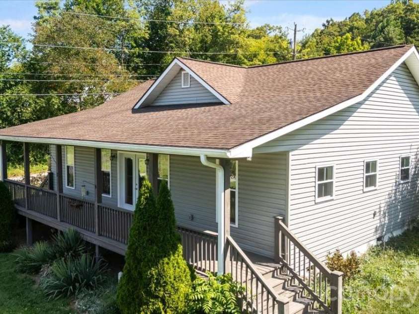 2 Elkmont Place, Asheville, NC 28804.  MLS# CAR4417768, YatesRealty ID 48512. Front and side of home