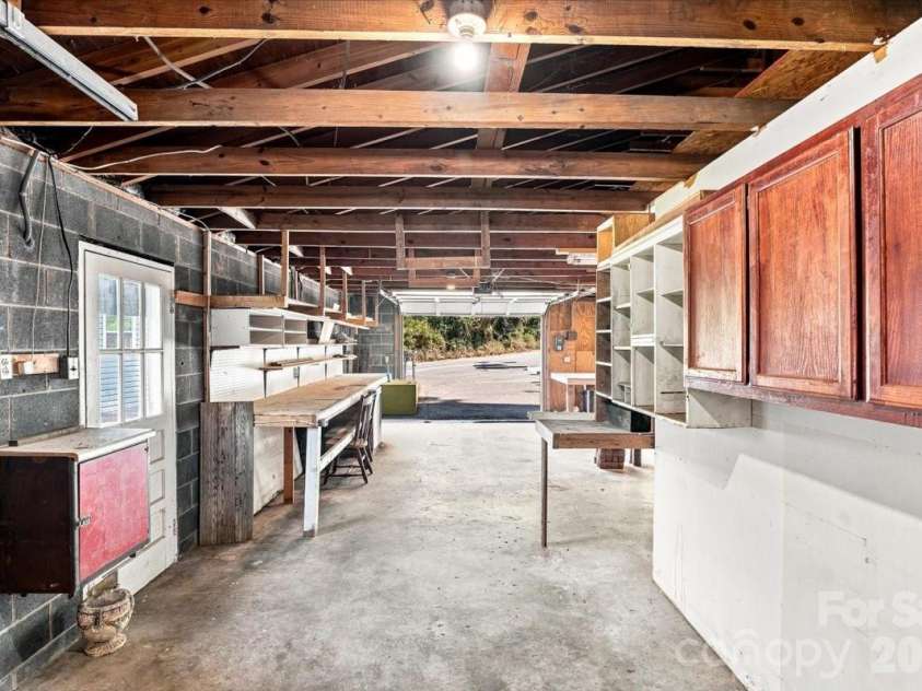 2 Elkmont Place, Asheville, NC 28804.  MLS# CAR4417768, YatesRealty ID 48512. Lots and lots storage