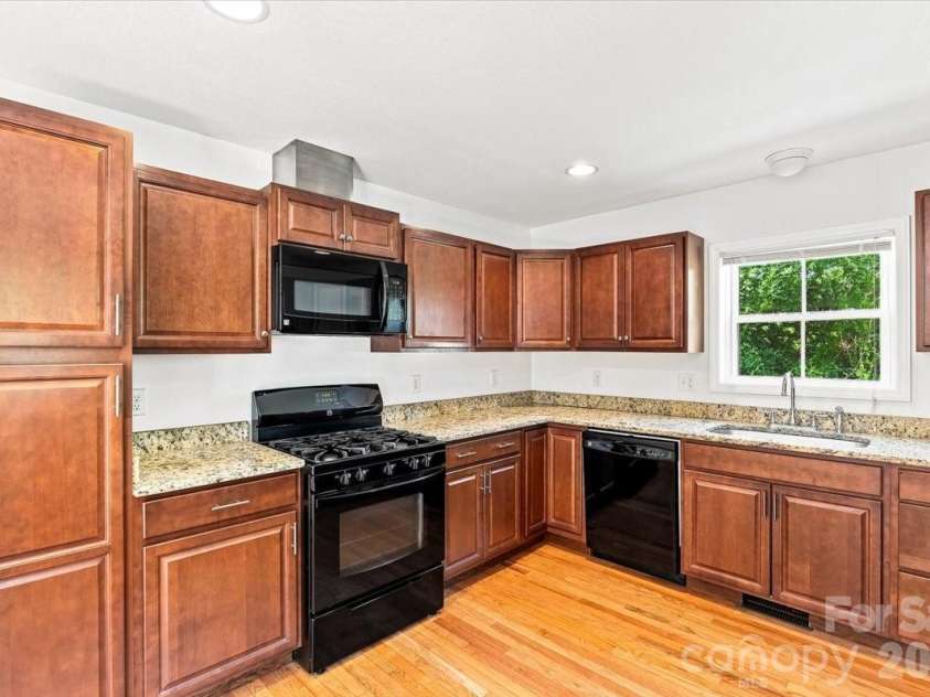 2 Elkmont Place, Asheville, NC 28804.  MLS# CAR4417768, YatesRealty ID 48512. Open kitchen
