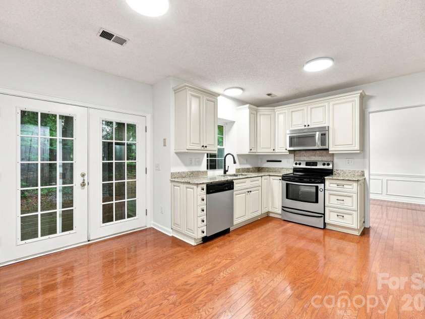 6004 Elm Cove Lane, Charlotte, NC 28269.  MLS# CAR4411201, YatesRealty ID 48515. 