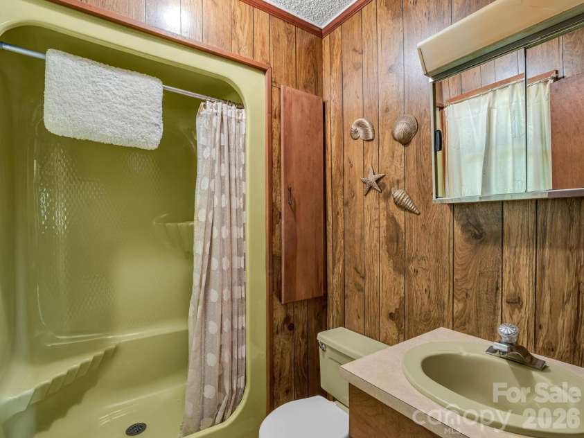 121 Greenfield Lane, Hendersonville, NC 28792.  MLS# CAR4420728, YatesRealty ID 48522. 