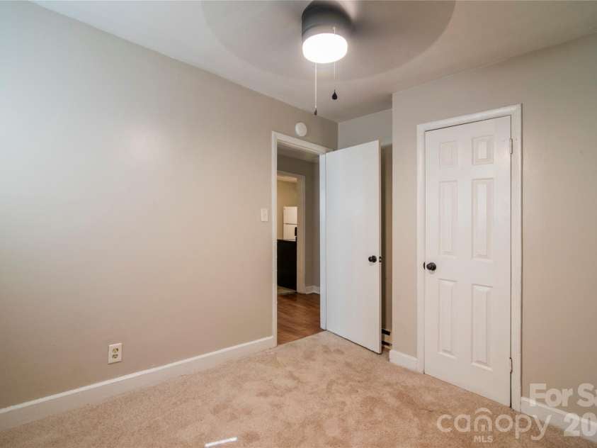 1812 Catherine Simmons Avenue, Charlotte, NC 28216.  MLS# CAR4420162, YatesRealty ID 48529. Rear unit bedroom