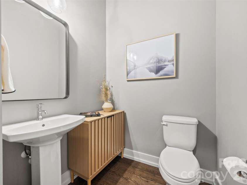 4017 Plaza Row Court, Charlotte, NC 28205.  MLS# CAR4420439, YatesRealty ID 48535. Convenient main-level powder bath