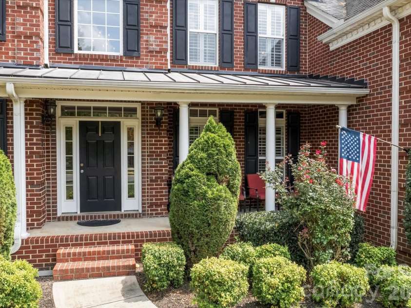 309 Stonewater Bay Lane, Mount Holly, NC 28120.  MLS# CAR4416321, YatesRealty ID 48538. Covered Front Porch
