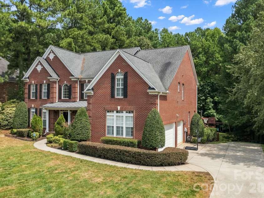 309 Stonewater Bay Lane, Mount Holly, NC 28120.  MLS# CAR4416321, YatesRealty ID 48538. Driveway View