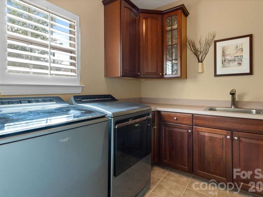 309 Stonewater Bay Lane, Mount Holly, NC 28120.  MLS# CAR4416321, YatesRealty ID 48538. Laundry Room