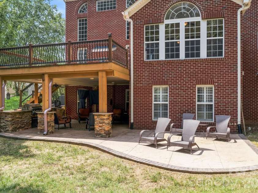 309 Stonewater Bay Lane, Mount Holly, NC 28120.  MLS# CAR4416321, YatesRealty ID 48538. Patio & Deck View