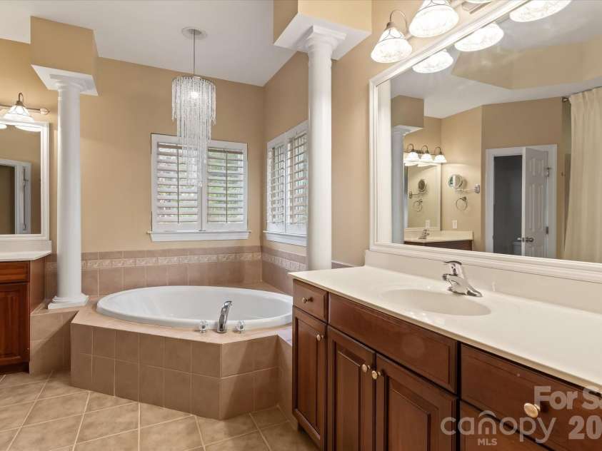 309 Stonewater Bay Lane, Mount Holly, NC 28120.  MLS# CAR4416321, YatesRealty ID 48538. Primary Bath