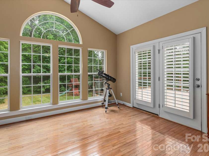 309 Stonewater Bay Lane, Mount Holly, NC 28120.  MLS# CAR4416321, YatesRealty ID 48538. Sun Room