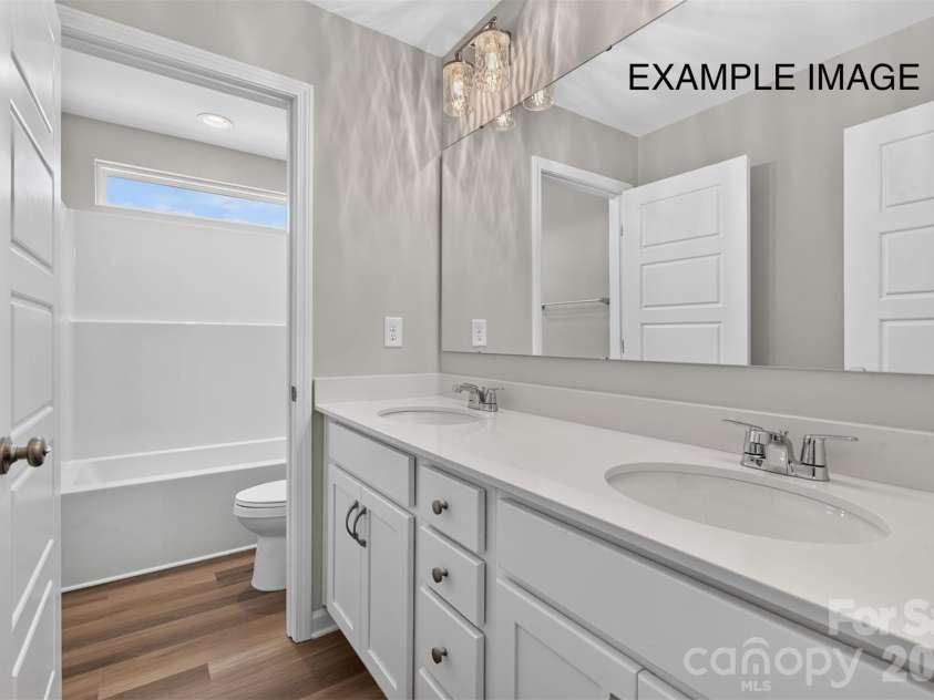 1680 Tabby Drive, Indian Trail, NC 28079.  MLS# CAR4398459, YatesRealty ID 48541. Example Photo - Bath 2