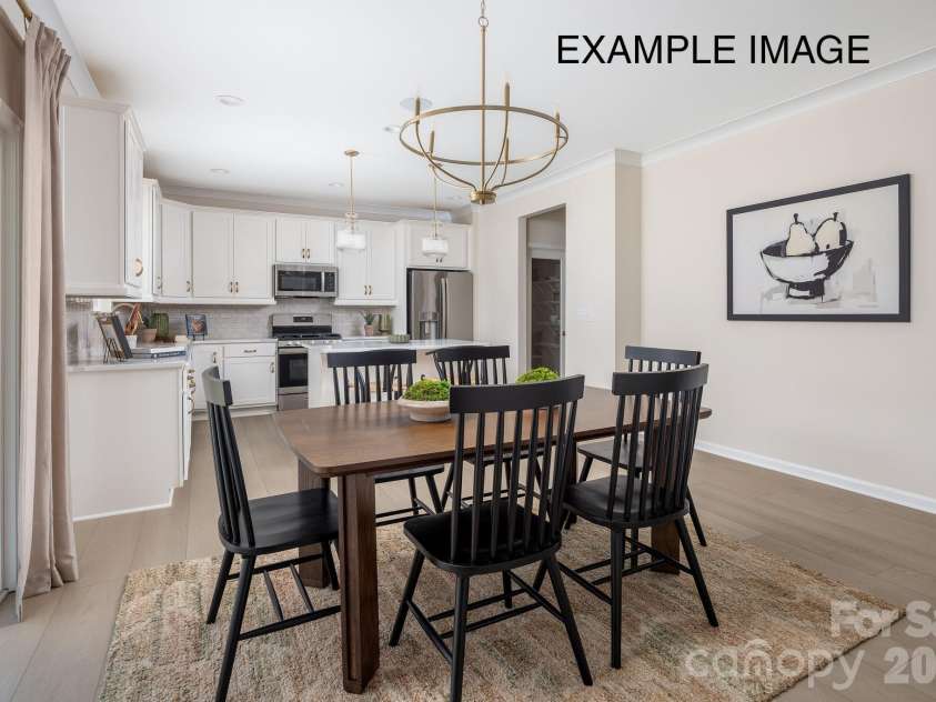 1680 Tabby Drive, Indian Trail, NC 28079.  MLS# CAR4398459, YatesRealty ID 48541. Example Photo - Dining/Kitchen