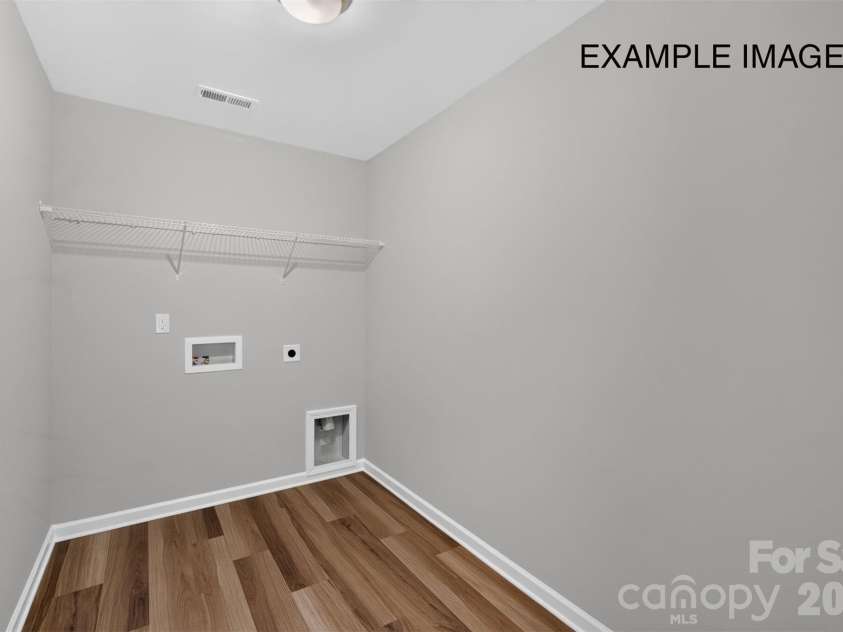 1680 Tabby Drive, Indian Trail, NC 28079.  MLS# CAR4398459, YatesRealty ID 48541. Example Photo - Laundry Room
