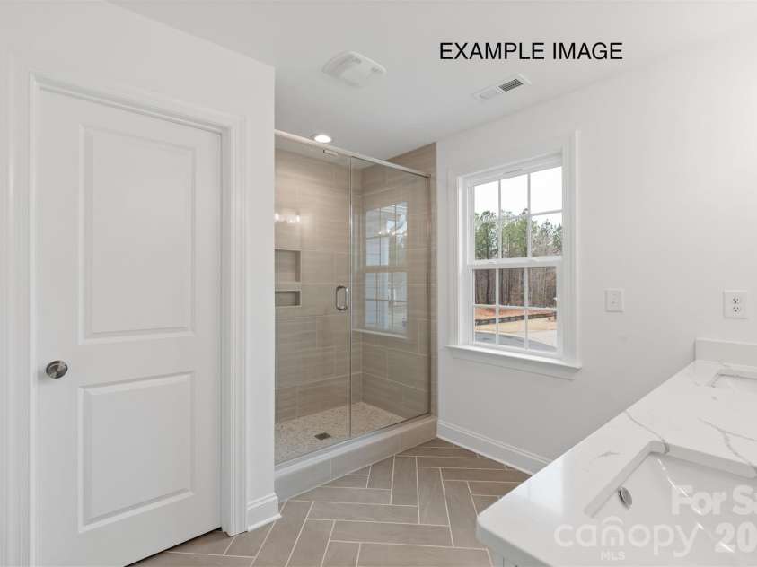 1680 Tabby Drive, Indian Trail, NC 28079.  MLS# CAR4398459, YatesRealty ID 48541. Example Photo - Premier Bath