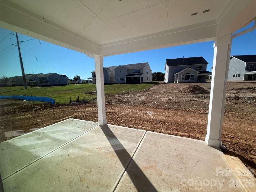 1680 Tabby Drive, Indian Trail, NC 28079.  MLS# CAR4398459, YatesRealty ID 48541. Rear Covered Patio