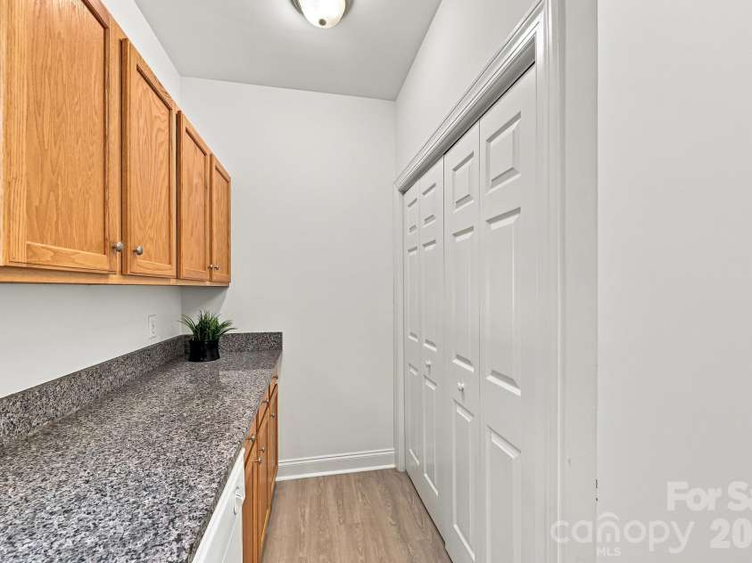 19832 Feriba Place, Cornelius, NC 28031.  MLS# CAR4412885, YatesRealty ID 48559. Convenient Laundry Space