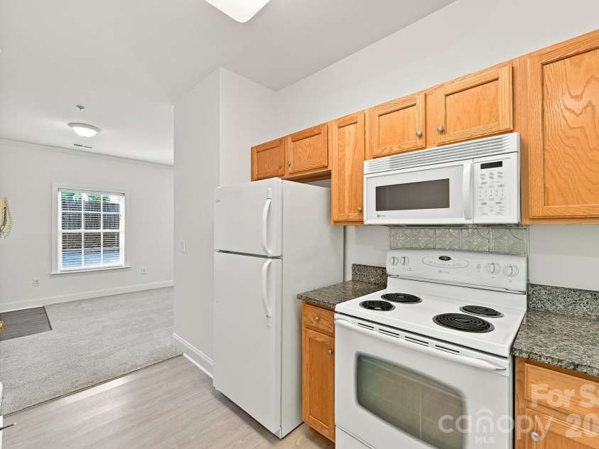 19832 Feriba Place, Cornelius, NC 28031.  MLS# CAR4412885, YatesRealty ID 48559. Refrigerator remains with the home