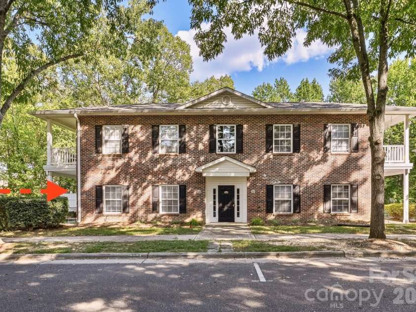 19832 Feriba Place, Cornelius, NC 28031.  MLS# CAR4412885, YatesRealty ID 48559. The arrow points to the condominium