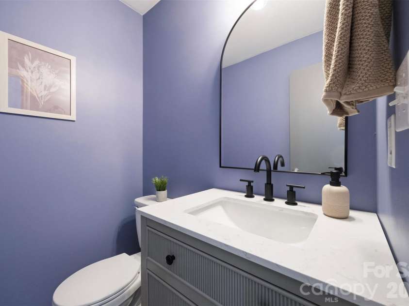 3015 Point Clear Drive, Tega Cay, SC 29708.  MLS# CAR4421189, YatesRealty ID 48568. Half Bath on main level