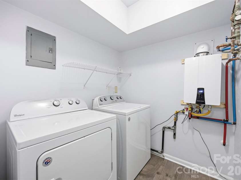 3015 Point Clear Drive, Tega Cay, SC 29708.  MLS# CAR4421189, YatesRealty ID 48568. Laundry on lower level