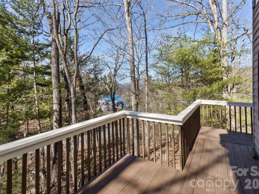 111 Sunny Ridge Drive, Asheville, NC 28804.  MLS# CAR4421169, YatesRealty ID 48587. Lower level deck