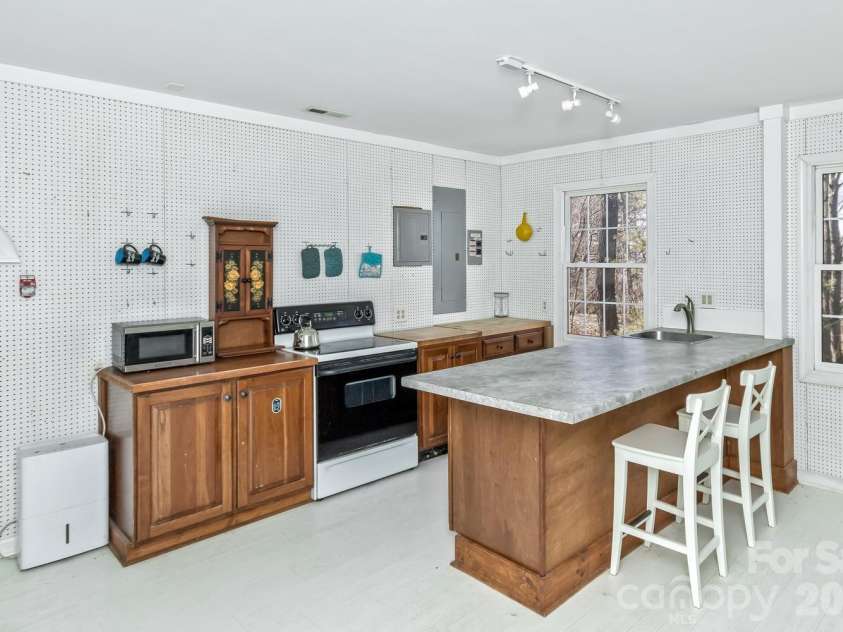 111 Sunny Ridge Drive, Asheville, NC 28804.  MLS# CAR4421169, YatesRealty ID 48587. Lower level kitchen