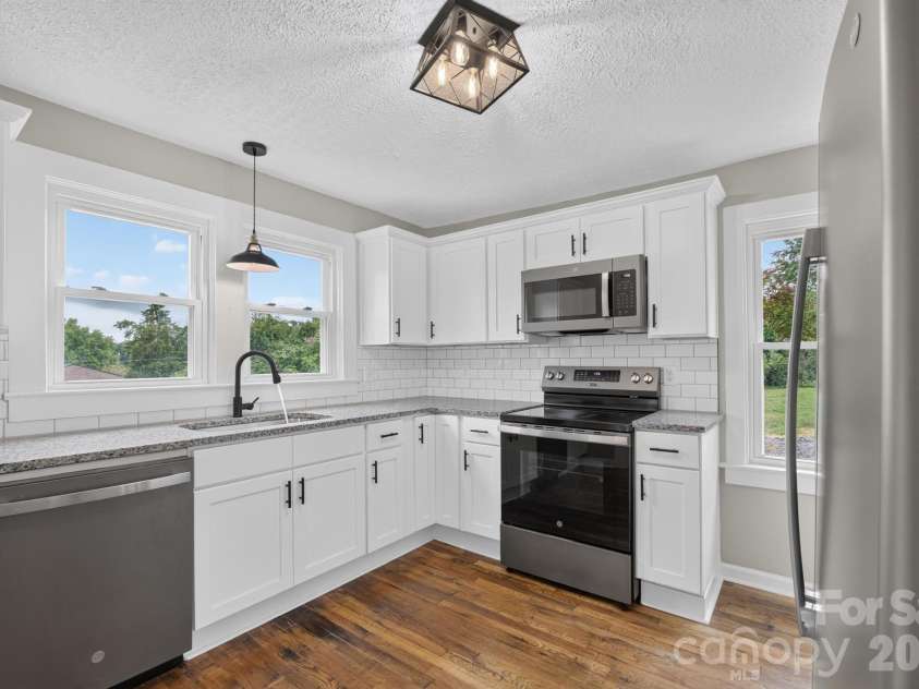 410 Spruce Street, Lenoir, NC 28645.  MLS# CAR4410163, YatesRealty ID 48588. 
