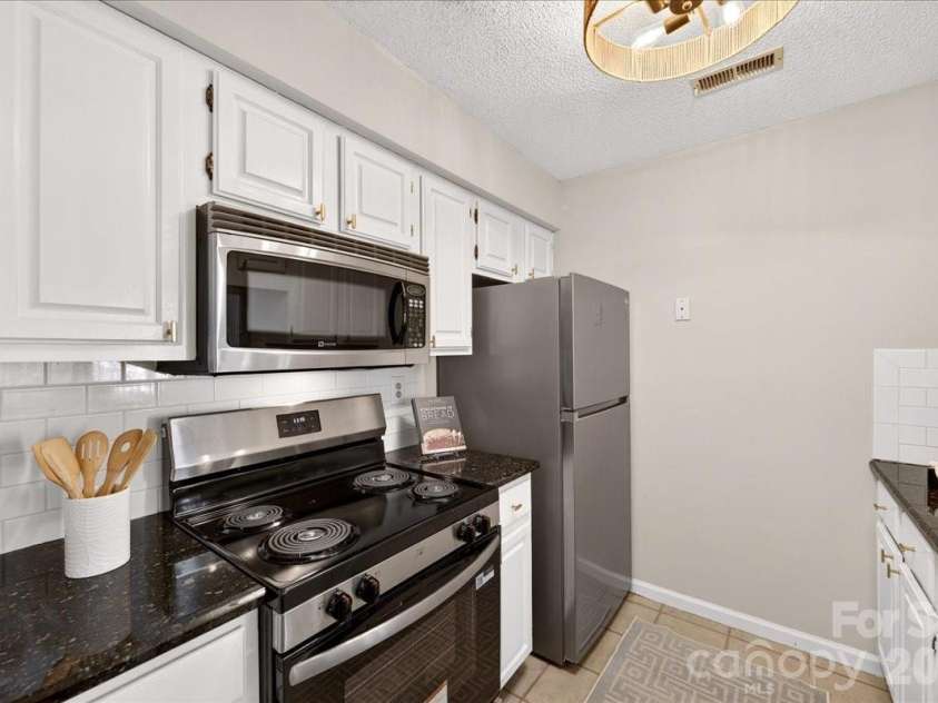 5011 Sharon Road, Charlotte, NC 28210.  MLS# CAR4419195, YatesRealty ID 48591. 