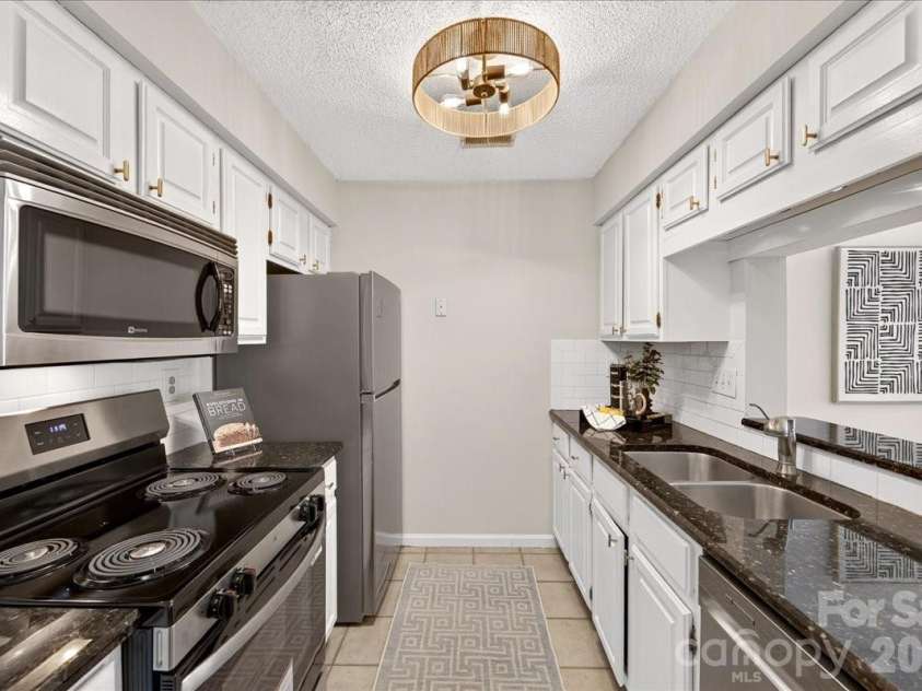 5011 Sharon Road, Charlotte, NC 28210.  MLS# CAR4419195, YatesRealty ID 48591. 