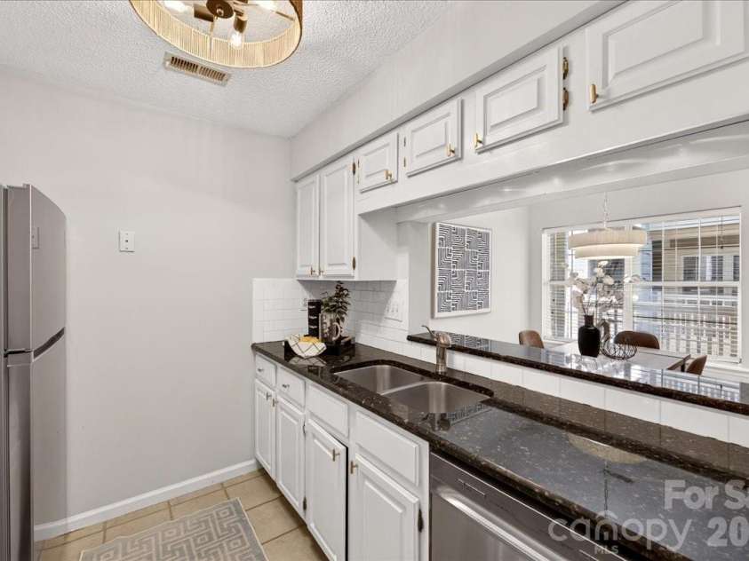5011 Sharon Road, Charlotte, NC 28210.  MLS# CAR4419195, YatesRealty ID 48591. 