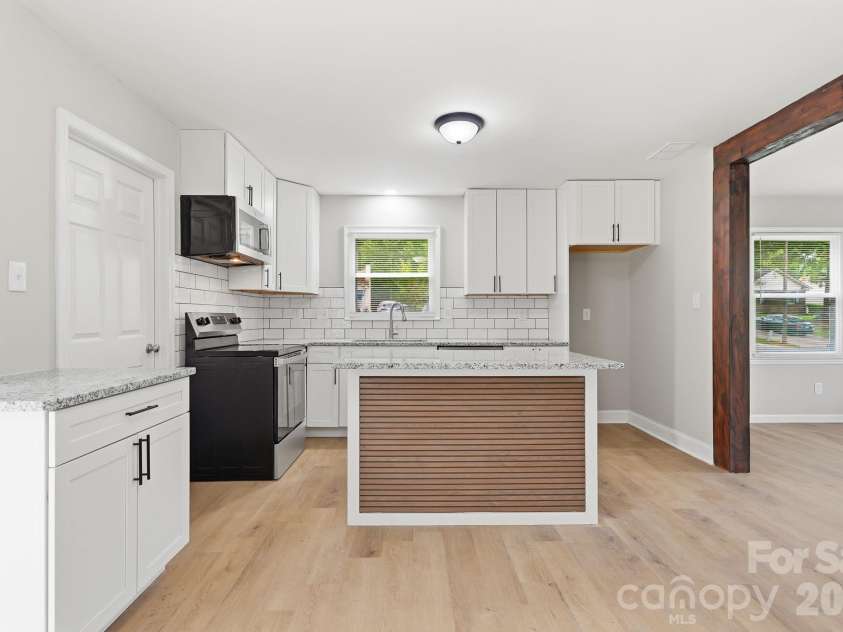 5233 Delivau Drive, Charlotte, NC 28215.  MLS# CAR4420867, YatesRealty ID 48592. Second shot of the kitchen.