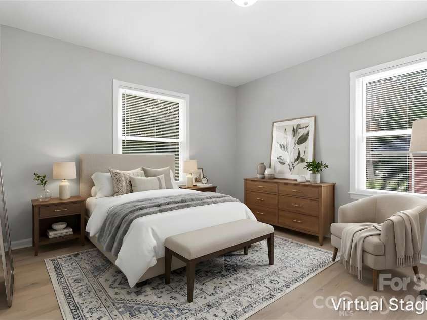 5233 Delivau Drive, Charlotte, NC 28215.  MLS# CAR4420867, YatesRealty ID 48592. Walking into the second bedroom (virtually staged & enhanced).