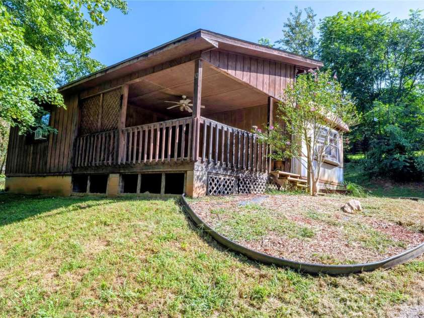 30 & 32 Skyland Circle, Asheville, NC 28804.  MLS# CAR4421300, YatesRealty ID 48597. 1974 Trailer