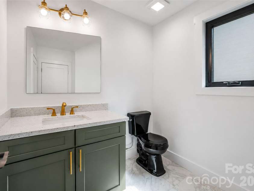 138 Shiloh Road, Asheville, NC 28803.  MLS# CAR4420583, YatesRealty ID 48599. Beautiful Main Level Half Bath