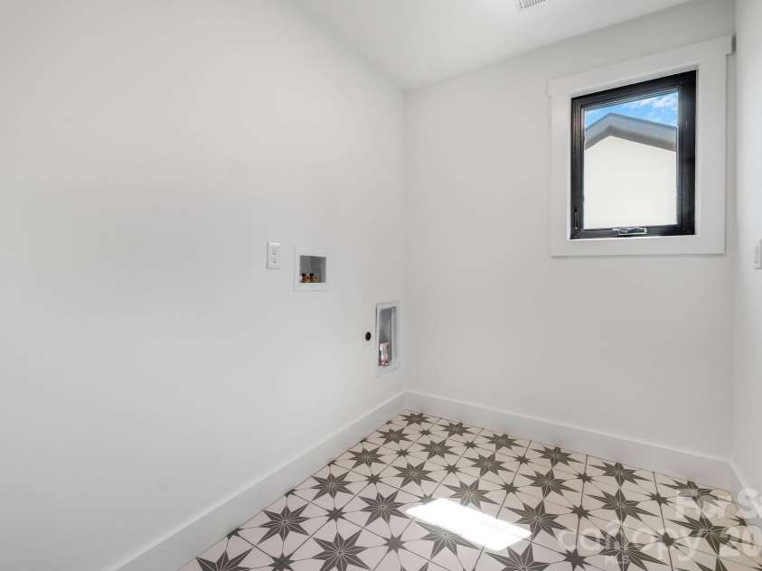 138 Shiloh Road, Asheville, NC 28803.  MLS# CAR4420583, YatesRealty ID 48599. Convenient Upper Level Laundry Room