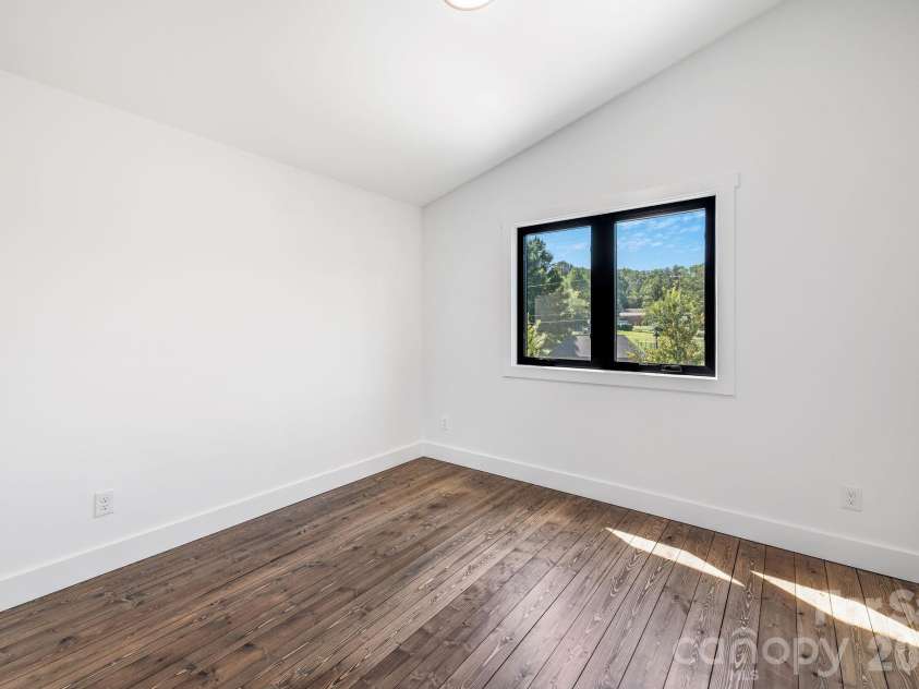 138 Shiloh Road, Asheville, NC 28803.  MLS# CAR4420583, YatesRealty ID 48599. Second Upper Level Bedroom with Vaulted Ceilings