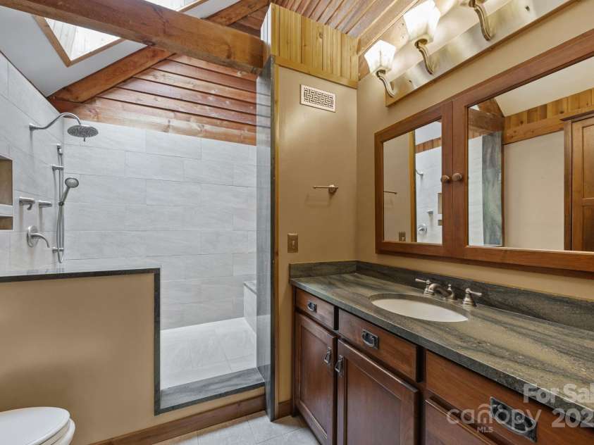 71 Kuykendall Branch, Asheville, NC 28804.  MLS# CAR4293308, YatesRealty ID 4860. Primary bathroom w/large walk in shower
