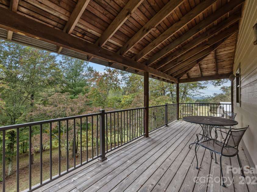 71 Kuykendall Branch, Asheville, NC 28804.  MLS# CAR4293308, YatesRealty ID 4860. Private and spacious side porch