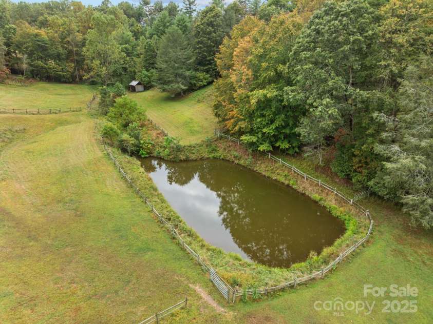 71 Kuykendall Branch, Asheville, NC 28804.  MLS# CAR4293308, YatesRealty ID 4860. Stocked pond