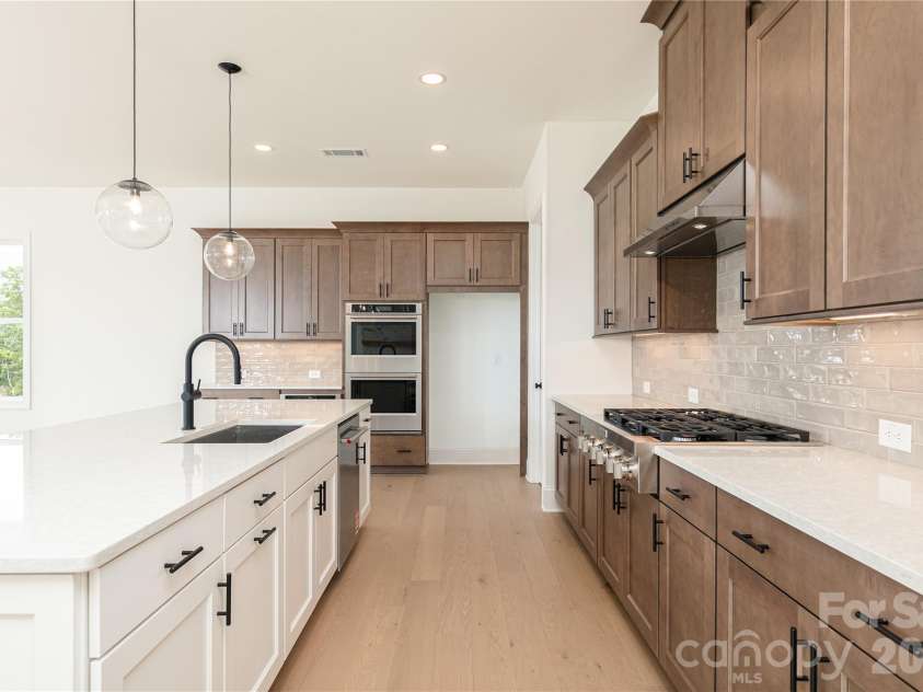 4110 Pinekirk Drive, Charlotte, NC 28269.  MLS# CAR4421354, YatesRealty ID 48600. Cabinet Color that will be in the kitchen
