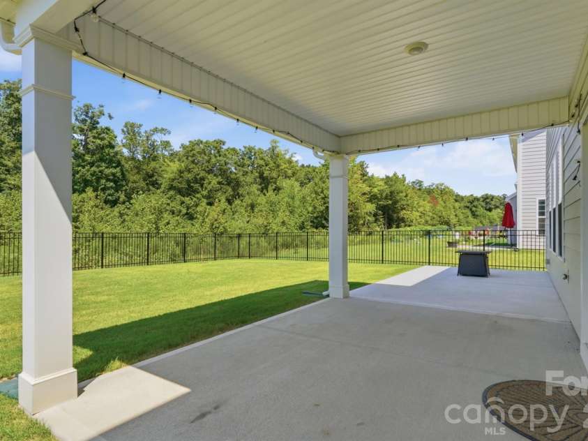 1060 Merganser Way, Indian Trail, NC 28079.  MLS# CAR4417669, YatesRealty ID 48601. Covered Back Patio