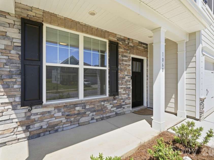 1060 Merganser Way, Indian Trail, NC 28079.  MLS# CAR4417669, YatesRealty ID 48601. Covered Front Porch