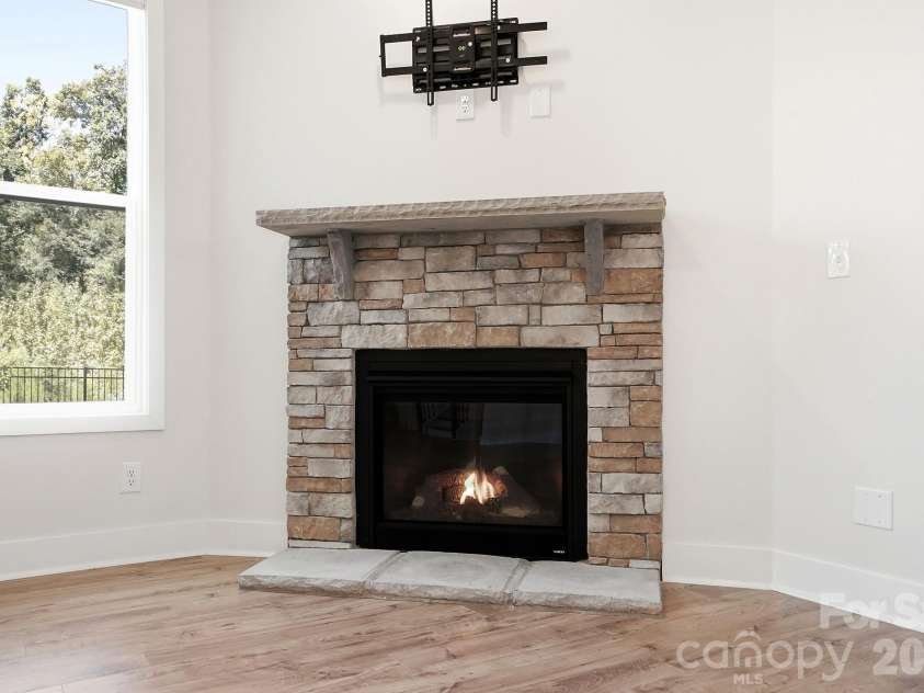 1060 Merganser Way, Indian Trail, NC 28079.  MLS# CAR4417669, YatesRealty ID 48601. Stone Fireplace