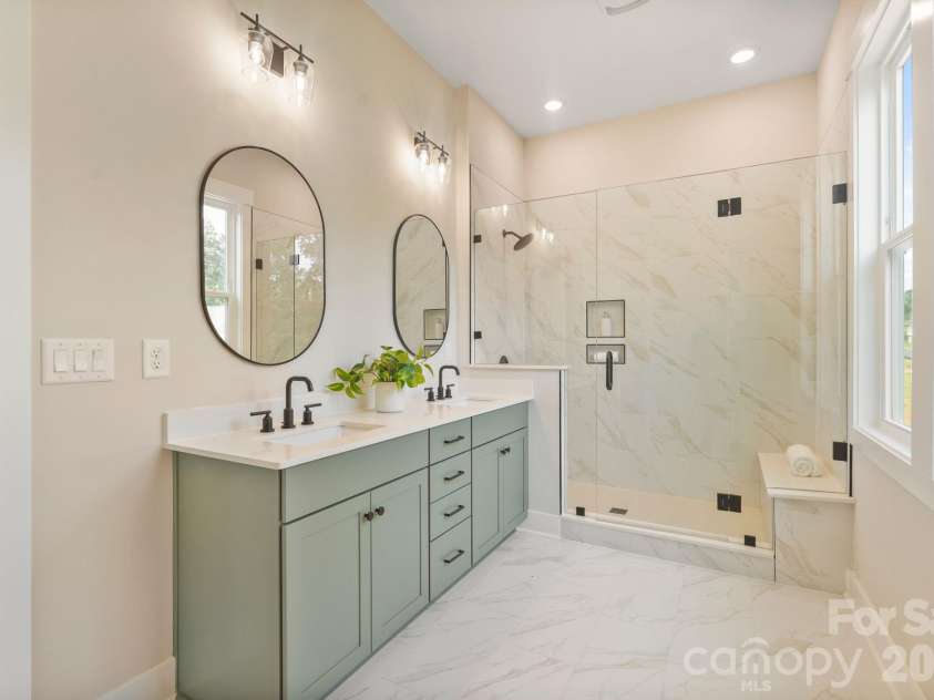 4531 Splash Trail, Sherrills Ford, NC 28673.  MLS# CAR4418307, YatesRealty ID 48603. Walk-in tile shower and dual vanities