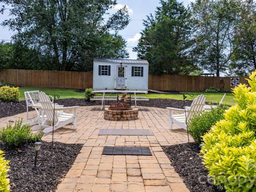123 Idlebrook Road, Statesville, NC 28677.  MLS# CAR4420365, YatesRealty ID 48608. Backyard with Firepit