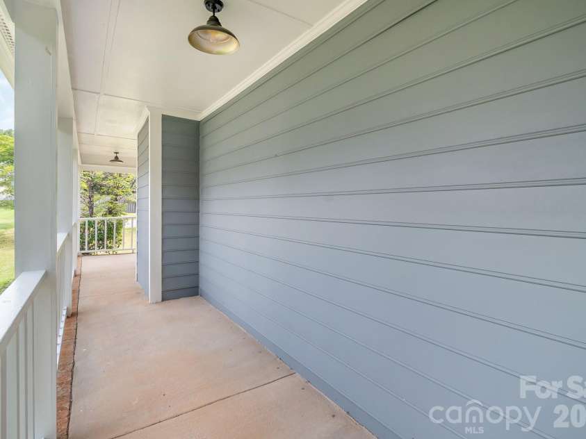 8314 David Lee Lane, Charlotte, NC 28227.  MLS# CAR4420448, YatesRealty ID 48617. Covered front porch