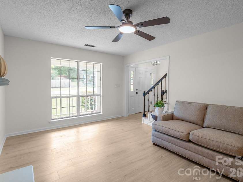 8314 David Lee Lane, Charlotte, NC 28227.  MLS# CAR4420448, YatesRealty ID 48617. Living room