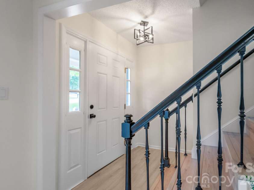 8314 David Lee Lane, Charlotte, NC 28227.  MLS# CAR4420448, YatesRealty ID 48617. Staircase / entry
