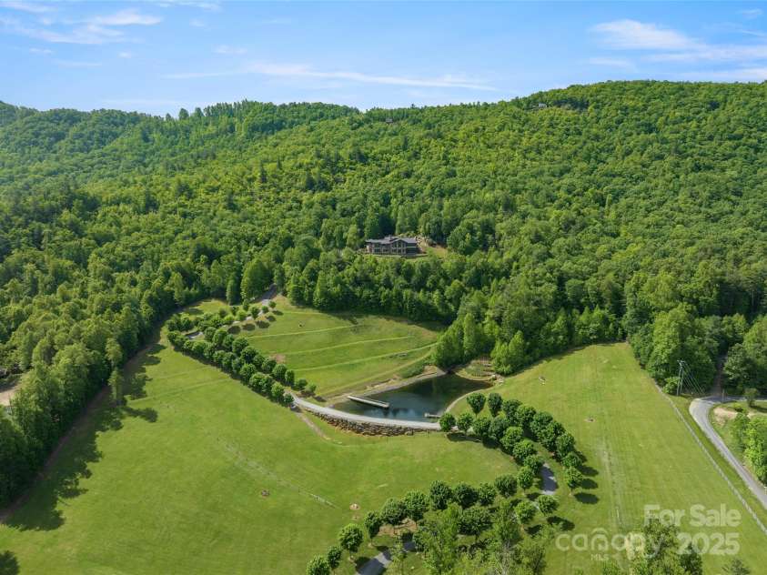 1547 Walnut Cove Road, Hendersonville, NC 28739.  MLS# CAR4326840, YatesRealty ID 4862. Fenced pastures and pond